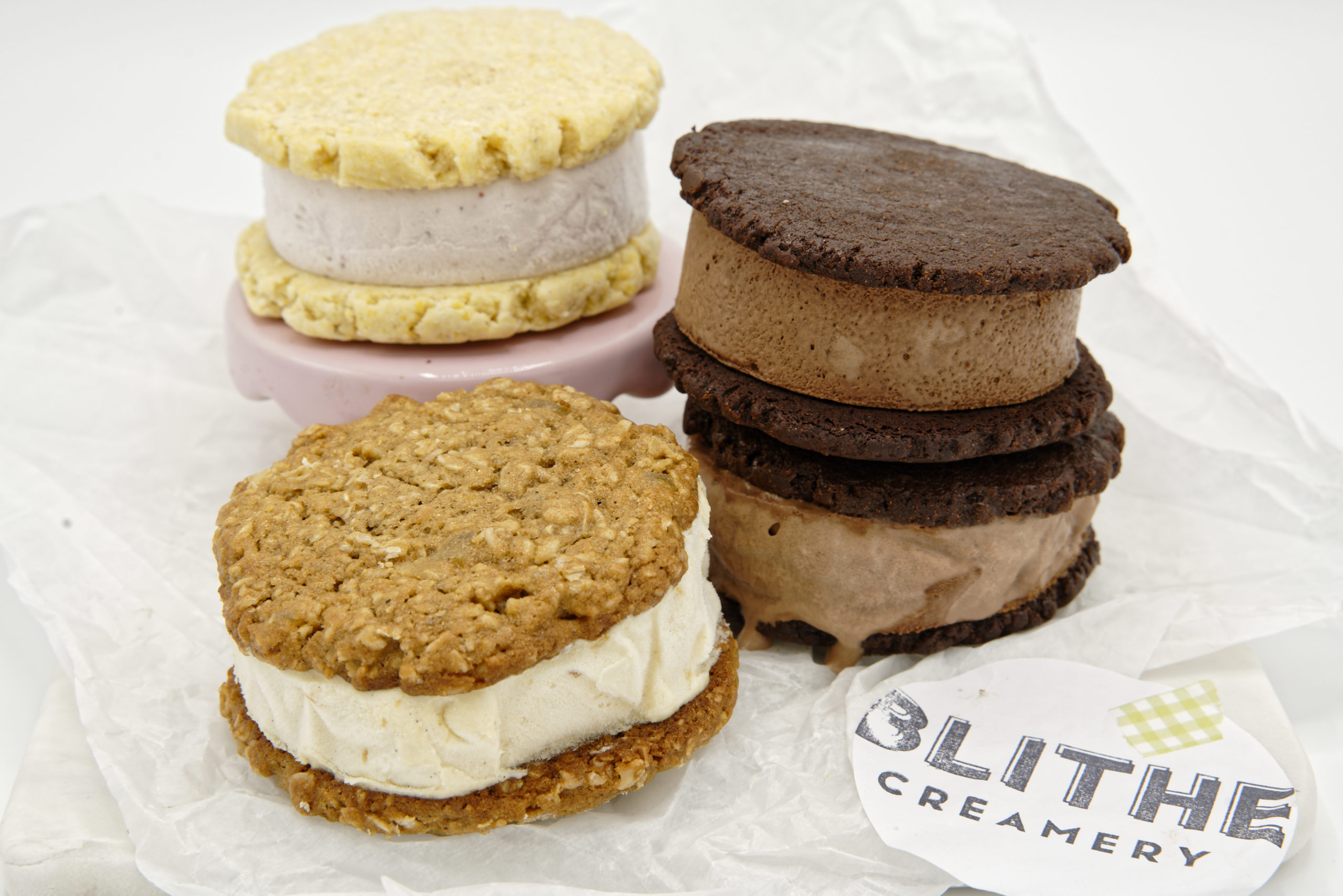 Various flavors of ice cream sandwiches arranged next to each other